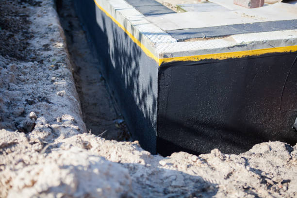 Professional Waterproofing technician working in Haymarket, VA